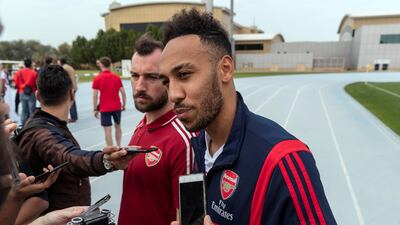 Pierre-Emerick Aubameyang talks to the media in Dubai on Monday. Antonie Robertson/The National