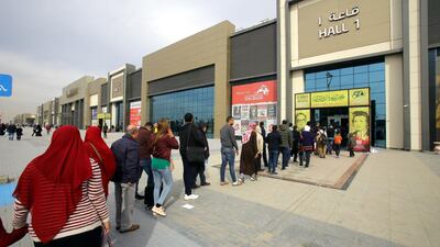 Visitors queue up outside for this year's Cairo International Book Fair. EPA