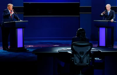 Donald Trump and Joe Biden face off in a 2020 presidential election debate. Reuters