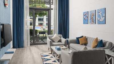 Coastal interiors await guests checking in to the five-star hotel.