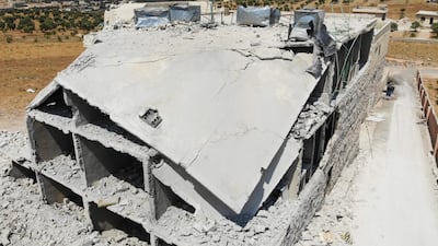 Destroyed buildings in the town of Maaret Hurmah in the southern countryside of Syria's northwestern Idlib province on August 5, 2019. AFP