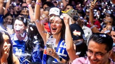 French fans celebrate at Bla Bla at the Beach in Dubai as their team scores. Photos: Ruel Pableo for The National