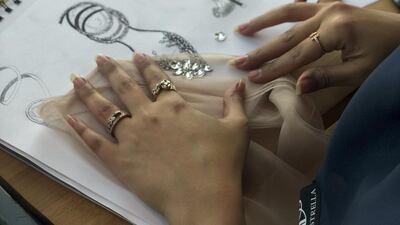 The shoe is made of nude lace and Swarovski crystals