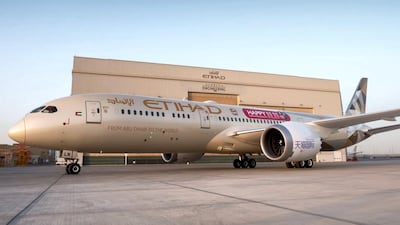 An Etihad plane stands on the runway with the new livery. Photo: Etihad Airways