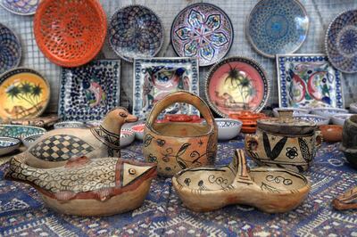 Pottery crafted in Sejnane is displayed at a souvenir shop in Tunis. AFP