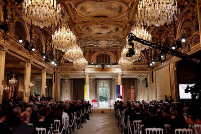 President Emmanuel Macron speaks alongside Pope Leo XIV at the Elysee Palace. AFP