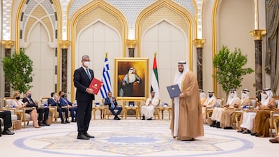 Mohamed Al Suwaidi, chief executive of ADQ and Ioannis Tsakiris, Greece's Deputy Minister for Development and Investments.