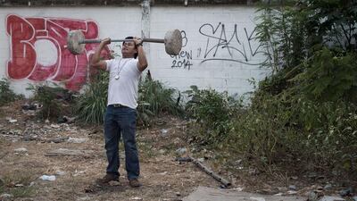 A man exercising in Bangkok. Thailand’s economy grew at a lacklustre 0.6 per cent in the third quarter of 2014, prompting authorities to again clip the full year growth forecast, in a blow to a junta which has vowed to kick-start the economy following their coup. Nicolas Asfouri / AFP