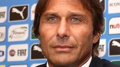Italy’s new manager Antonio Conte, who quit his job as Juventus coach last month after leading them to three consecutive Serie A titles, has inherited a squad that was left reeling from a shock first-round exit in Brazil. AFP PHOTO / ALBERTO PIZZOLI