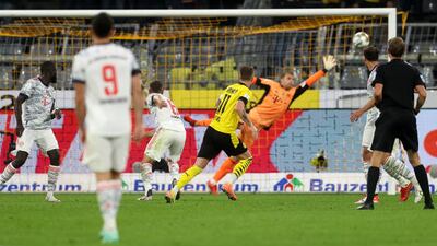 Marco Reus scores for Borussia Dortmund.