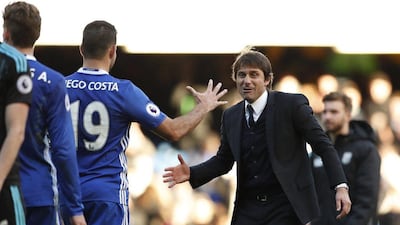Anotonio Conte greets match winner Diego Costa after the 1-0 Premier League win over West Bromwich Albion. John Sibley / Reuters