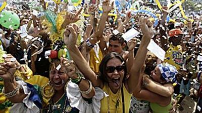 Residents celebrate on Copacabana beach after Rio de Janeiro won the bid to host the 2016 Olympic Games.