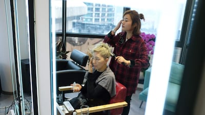 Ma Yinhong during a visit to a salon in Shanghai. AFP