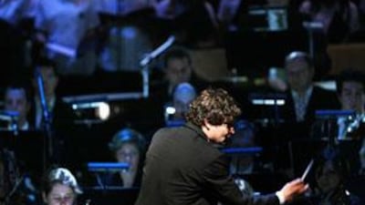 Under the direction of conductor Markus Huber, musicians and singers in the Lord of the Rings Symphony perform at the Emirates Palace.