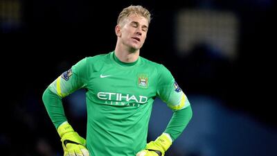 Joe Hart cuts a dejected figure as Manchester City slip to defeat. Peter Powell/EPA