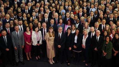 Mr Starmer stands with Labour MPs at Church House in Westminster, London, days after the party's general election victory, in July 2024. Getty Images