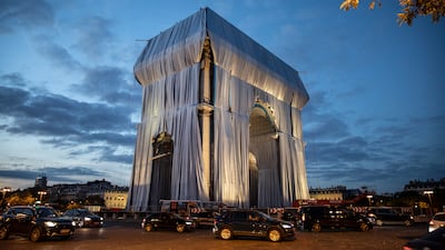 The process of wrapping up the Arc De Triomphe monument in silver-blue fabric has begun in Paris, France. Getty Images