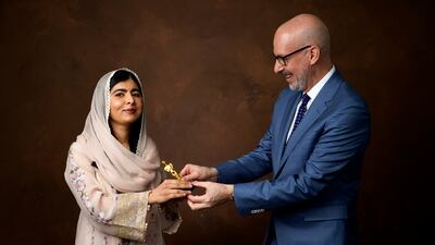 Malala Yousafzai and Joshua Seftel. AP
