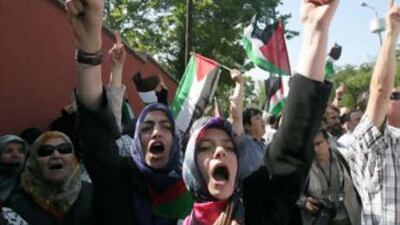 Turks protest on against Israel in front of the Israeli ambassador's residence in Ankara.