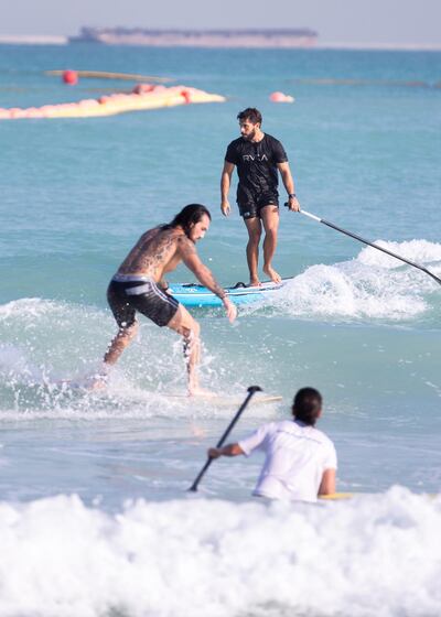 Dubai has a growing paddleboarding community, and Surf House founder Scott Chambers hopes to encourage others. Reem Mohammed / The National