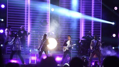 Bruno Mars performs onstage during the Grammys. Valerie Macon / AFP