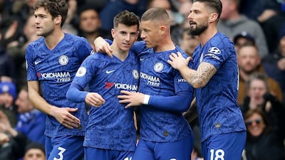 Mason Mount, second left, celebrates scoring Chelsea's first goal in their 4-0 victory against Everton at Stamford Bridge on Sunday. Reuters