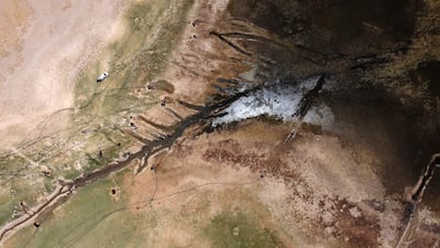 Farmers pump water from the Euphrates to irrigate their land in dry conditions in Syria's Raqqa governorate. AFP