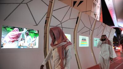 Saudi men arrive to attend the Quality of Life event. Fayez Nureldine / AFP