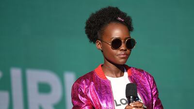 Lupita Nyong'o complained her hair had been airbrushed out of a picture on the front cover of women's magazine Grazia UK. Angela Weiss/ AFP Photo