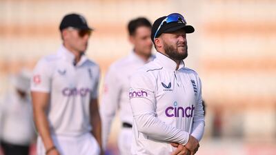 England's Ben Duckett winces as he leaves the field after injuring his wrist. Getty Images
