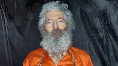 This Image provided by the Federal Bureau of Investigation(FBI) shows a photo of former FBI agent Robert Levinson, who went missing on Kish Island, Iran, on March 9, 2007, shackled and holding a sign. The United States announced a $5 million increased reward March 9, 2015 for information leading to the return of Levinson, as it marked the eighth anniversary of his mysterious disappearance in Iran. The FBI had previously issued a $1 million reward for Levinson's return in 2012, five years after he went missing. AFP PHOTO / HANDOUT / FBI == RESTRICTED TO EDITORIAL USE / MANDATORY CREDIT: "AFP PHOTO / HANDOUT / FBI "/ NO MARKETING / NO ADVERTISING CAMPAIGNS / NO A LA CARTE SALES / DISTRIBUTED AS A SERVICE TO CLIENTS == (Photo by -- / FBI / AFP)