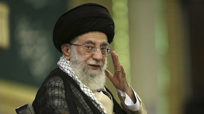 Iran's supreme leader Ayatollah Ali Khamenei, waves during a meeting in Tehran on September 7, 2014. AP