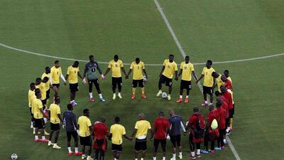 Ghana circle around for a team meeting during a training session on Sunday in Natal ahead of their 2014 World Cup Group G opener against USA on Monday. Carlos Barria / Reuters / June 15, 2014