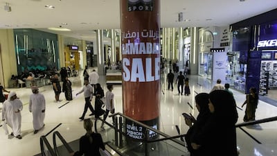 Shoppers packed malls around the country on Friday ahead of Eid Al Fitr. At Dubai Mall posters advertised bargains for the festival that marks the end of Ramadan and the start of Shawaal, the 10th month of the Islamic lunar calendar. Christopher Pike / The National