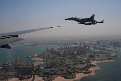 Qatari F-15 fighter jets escorted Air Force One as President Trump arrived in Doha. AP