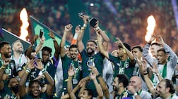 Soccer Football - Gulf Cup - Final - Saudi Arabia v United Arab Emirates - King Abdullah Sports City Stadium, Jeddah, Saudi Arabia - October 6, 2026 Saudi Arabia's Abdulelah Al Amri and teammates celebrate with the trophy after winning the Gulf Cup REUTERS / Ibraheem Abu Mustafa