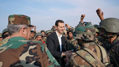 Sana repored that Assad visited regime troops "on the front line" with militants in Idlib. AFP