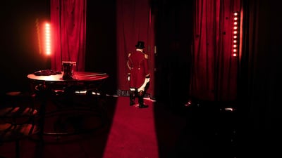 Circus ringmaster Alain Andre – aka Petit Gougou – prepares to enter the stage at the 48th Monte Carlo International Circus Festival in Monaco. AFP