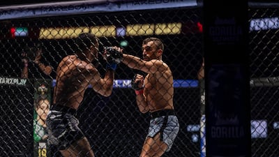 The second round saw the two featherweight tournament competitors trade leg kicks, knees, and punches in combination in a closely contested contest.