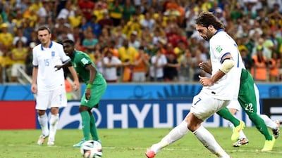 Georgios Samaras of Greece takes the penalty and scores for the 2-1 winner against Ivory Coast on Tuesday at the 2014 World Cup in Fortaleza, Brazil. Laurence Griffiths / Getty Images