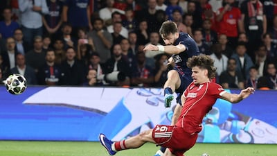 PSG's Khvicha Kvaratskhelia shoots at goal in the first half. Reuters