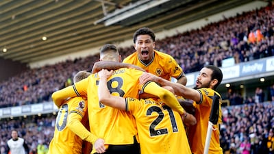 Wolverhampton Wanderers' players celebrate Pablo Sarabia's equalier. PA