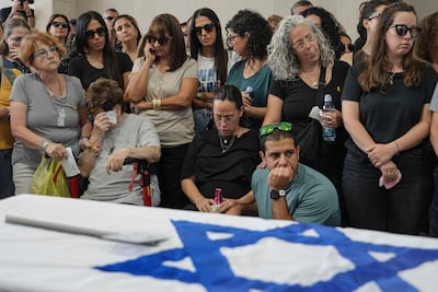 Mourners during the funeral of Michel Nisenbaum, in Ashkelon, who was killed during Hamas's October 7 attack but whose body was taken to Gaza. AP