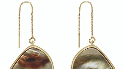 Dangly arrings highlight various facial features