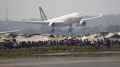 The airplane carrying Pope Francis lands in Bangui, Central African Republic, on November 29, 2015. This is the pope’s final stop in Africa, and where he will seek to heal a country wracked by conflict between Muslims and Christians. Jerome Delay / Associated Press