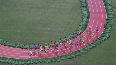 Performers take part in the opening ceremonies of the 2015 IAAF World Championships in athletics on Saturday at Beijing's Bird's Nest. Antonin Thuillier / AFP