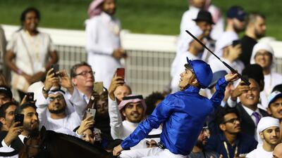 Christophe Soumillon celebrates after winning the Dubai World Cup with Thunder Snow. EPA