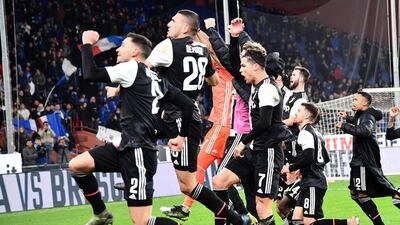 Juventus players celebrate at the whistle. EPA