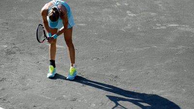 Eugenie Bouchard reacts during her loss to Lauren Davis on Wednesday at the WTA tournament in Charleston. Mic Smith / AP / April 8, 2015