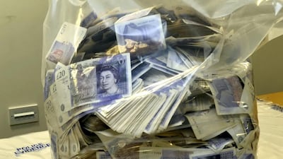 One of the bags of cash that money launderer Sathar Khan ,35, stuffed into 4 suitcases as he tried to fly to Dubai from Stansted Airport on August 29, 2018. SWNS